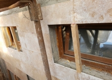 Работы по отделке здания травертином